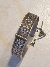 Bracelet d'enfant en argent massif jonc à décors florales