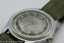 Rare style militaire Années 1940 bracelet montre Flora Swiss 17 JEWELS imperméable de l'OTAN