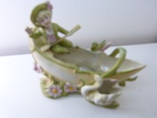 petite jardinière ,vide poche , en céramique , enfant a la barque   (pie12)