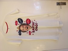 Elf T shirt/nuisette taille 4 (photo disant Santa OMG)