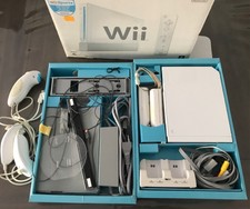 Console  wi + wi board + accessoires et jeux