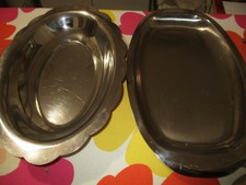 2plats vintage inox  1 plat ovale et une corbeille à pain. 
