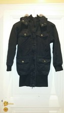 Parka noire pour fille en 10 ans en TBE