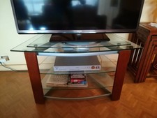 Grande table TV en verre et bois de très belle qualité. Parfait état. 