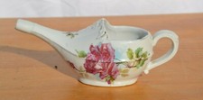 Ancien biberon de malade, canard en porcelaine à décor floral 