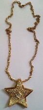 COLLIER DOREE FANTAISIE FEMME REPRESENTANT UNE 'GRANDE ETOILE EN STRASS' (102) 