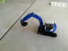 SIKU 3521 MINI PELLE SCHAEFF HR 32 A CHENILLES 1/55