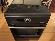 Cuisinière BRANDT BCI6656A induction 4 foyer Four pyrolyse