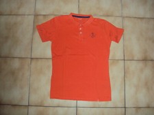 Polo orange à MC Vertbaudet en 14 ans en TBE 