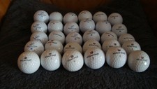 50 balles de golf wilson staff dx2 et dx3 en très bon état.
