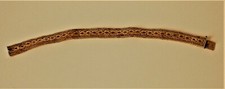 ANCIENBRACELET EN PLAQUE OR AVEC UNE MAILLE TRESSEE ORIGINALE POINCON