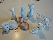lot de 9 chats / chatons Figurines porcelaine . 2 sur banc.