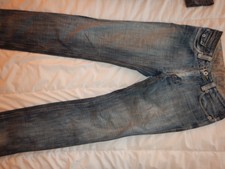 Jean femme " Les Ptites Bombes" taille 38 collector en bon état