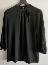 Pull H&M noir, finition col avec noeud T. 38/40