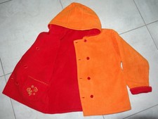 manteau polaire réversible orange ou rouge,boutons fille 10 ans