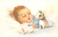 Enfant coucher avec son petit chien