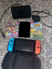 Nintendo Switch 32 Go console avec manettes néon + 2 jeux + Housse de rangement 