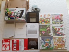 2DS edition Mario kart en boite  + cales + chargeur + housse protection + jeux