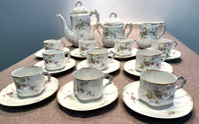 Service à thé en porcelaine de Paris à décor de fleurs et dorures 10 Tasses