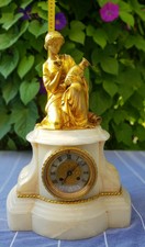 pendule marbre  blanc ,sujet en bronze dore signé Theodore Devaulx Ed Gautier