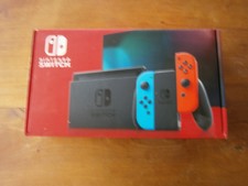 Nintendo Switch 32 Go Console avec Paire de Joy-Con - Bleu/Rouge