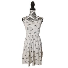 Kiabi Robe été sans manches en coton blanc et noir motifs palmiers taille 12 ans