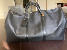 Authentique sac de voyage Louis Vuitton Keepall en cuir noir