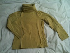 sous-pull fille OKAIDI  8 ans en excellent état