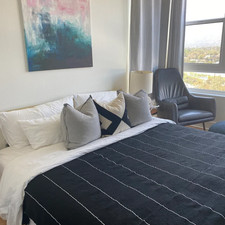 Plaid marocain en coton noir avec glands noirs et bandes argentées