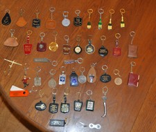 42 Porte-Clés divers: Champagne, constructeur automobile...