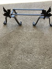 Cheminée ancien porte buches forgé décorée