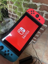 Nintendo Switch 32 Go Console Portable avec Manettes Joy-Con Bleu Néon/Rouge...