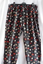 Pantalon fluide Monoprix Femme imprimé sur fond noir en viscose 42