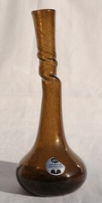 VERRERIE D'ART DE MONTAUROUX. Vase à col torsadé étroit en verre bullé brun