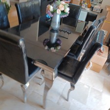 table salle à manger en verre, piètement acier chromé, plateau verre fumé