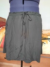 Jupe courte vert kaki évasée doublée 2 poches devant NAF NAF taille 42 TBE