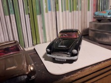 Aston Martin D.B.4 CORGI TOYS 21101/59 Made in Gt.Britain original jaune modifié