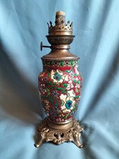 > Pied de lampe à pétrole Longwy en céramique à émaux grenat, monture bronze