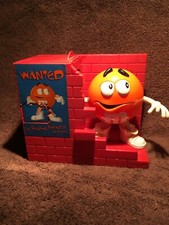M&M Orange Dispenser "Wanted - Feeding Frenzy Has Begun" circa 1999