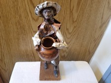 MEXICAN PAPER MACHE MAN HOLDING POT 