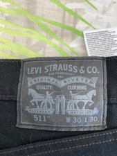 pantalon levi's 511 w30 l30 noir état neuf