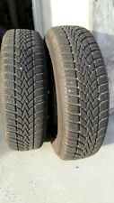 4 jantes tôles 4 trous avec pneus Dunlop SP Winter Response 2 175/65 R15 84T
