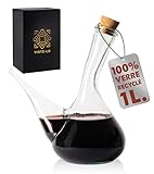Jarre à vin artisanale en verre. Verseur de vin en